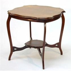 Edwardian shaped mahogany occasional table on cabriole legs, united by an undertier…