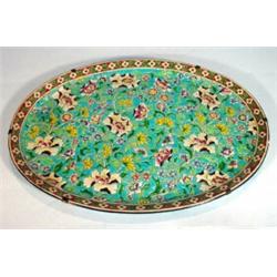 Large oval Longwy plate, hand enamelled with bright coloured flowers onto a turquoise ground, imp…