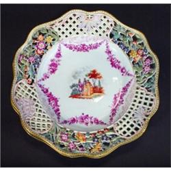 Meissen pierced hand painted floral plate, the central panel decorated with purple flowers and an…