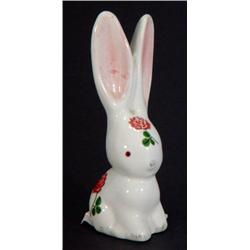 Seated Plitcha rabbit hand painted with flowers, marks to base, 10cm high…