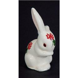 Seated Plitcha rabbit hand painted with flowers, marks to base, 8cm high…