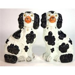 Pair of Victorian Staffordshire black and white dogs, 25cm high…