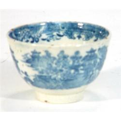 Early 19th century English pottery teabowl decorated with a blue and white 'Willow' pattern, 4cm …