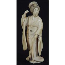 Well detailed Japanese carved ivory figure of a geisha girl with mother-of-pearl floral inlaid ba…