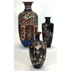 Three Cloisonne vases decorated with birds amongst trees and panels of dragons, largest 50cm high…