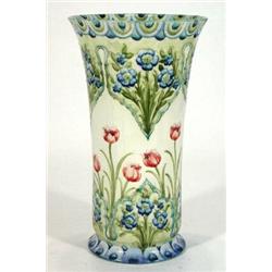 Large cylindrical Moorcroft MacIntyre vase with flared rim hand painted with tubelined flowers on…