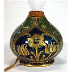 Moorcroft MacIntyre baluster vase converted to table lamp, gilded with panels of flowers onto a g…