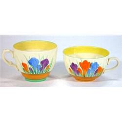 Two Clarice Cliff cups hand painted with 'Crocus' pattern, marks to base…