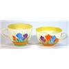 Image 1 : Two Clarice Cliff cups hand painted with 'Crocus' pattern, marks to base…