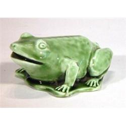 Green glazed Clement Massier Golfe Juan seated frog on lily pad, impressed marks to base, 12cm lo…