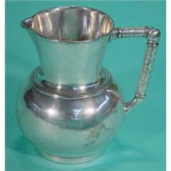 Christopher Dresser designed Elkington silver plated jug with chased angular handle and marks to …