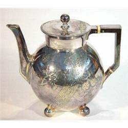 Christopher Dresser style silver plated globular tea pot with angular handle, chased with flowers…