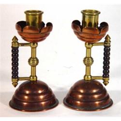 Small pair of brass and copper Arts and Crafts style candlesticks with wooden bobbin turned handl…