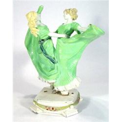 Large Austrian pottery figure group of two Art Deco girls in long green flowing dresses dancing s…