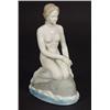 Image 1 : Grey glazed Continental porcelain mermaid seated on a rock, marks to base, 25cm high…