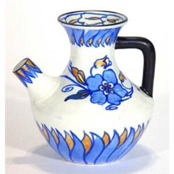 Frederick Rhead design Wardle pottery jug hand painted with blue and brown flowers, inscribed and…