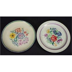 Two Poole pottery plates hand painted with flowers, marks to back, 25cm diameter…