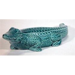 Turquoise glazed Poole crocodile, marks to base, 28cm in length…