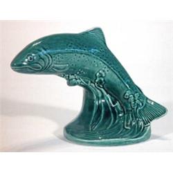 Turquoise glazed Poole leaping trout, marks to base, 14cm high…