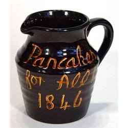 Treacle glazed Victorian pottery jug entitled 'Pancakes for All, 1846', 19cm high…