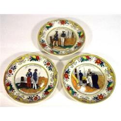 Three French Victorian pottery plates hand coloured and transfer printed with scenes of military …