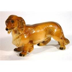 Hand painted German porcelain dachshund, marks to base, 20cm in length…