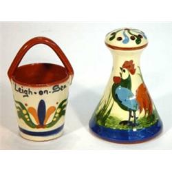 Longpark mottoware pepperpot and a Torquay pottery bucket, marks to base, largest 12cm high…