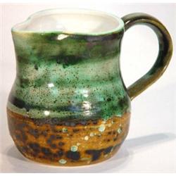 David Sharp Rye pottery jug with a brown and green glaze, painted marks to base, 13cm high…