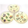 Two hand painted Honiton pottery plates, created with stylised flowers, marks to back, 23cm diame…