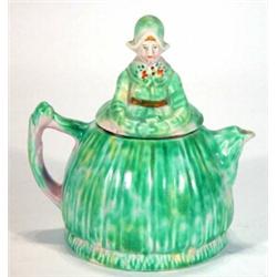 Mottled green glazed Arthur Wood crinoline lady teapot, marks to base, 20cm high…