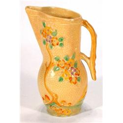 Crown Devon jug hand painted with relief moulded flowers and branch handle, marks to base, 25cm h…