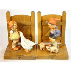 Pair of wooden mounted Hummel bookends, 'A Girl with Geese' and ' Boy with Pigs', 16cm high…