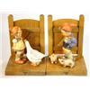 Image 1 : Pair of wooden mounted Hummel bookends, 'A Girl with Geese' and ' Boy with Pigs', 16cm high…