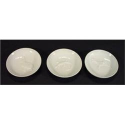 Three Berlin porcelain dishes embossed with animals, marks to base, 9cm diameter…