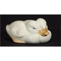 Royal Copenhagen duckling group, blue underglaze marks to base, 8cm in length…