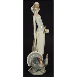 Hand painted Lladro figurine amongst turkeys, impressed and printed marks to base, 36cm high…