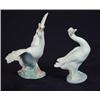 Image 1 : Lladro goose with raised wings and a seated Lladro goose, printed marks to base, largest 14cm hig…