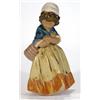 Image 1 : Lladro figurine of girl clutching a basket with crossed arms, glazed in blues, oranges and browns…