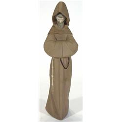 Lladro figure of a monk with folded arms in a brown unglazed cloak, printed marks to base, 36cm h…