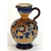 Image 1 : Doulton Lambeth stoneware jug decorated with a raised band of stylised flowers, impressed marks a…