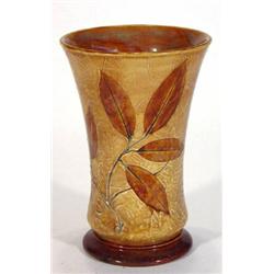 Doulton Lambeth stoneware vase decorated with autumn leaves onto a brown ground, impressed and 'M…