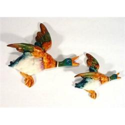 Two graduated hand painted Beswick flying grouse wall plaques, marks to back, largest 21cm long…