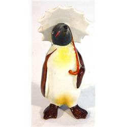 Hand painted Beswick penguin clutching an umbrella, 11cm high…