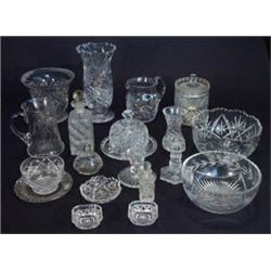 Large quantity of assorted cut glassware including jugs, bowls, vases, cheese dish and cover, etc…