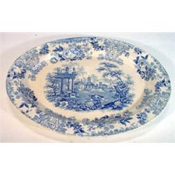 Victorian oval meat plate decorated with a blue and white transfer print of cows amongst ruins wi…