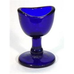 Moulded Victorian blue glass eyebath, 7cm high…