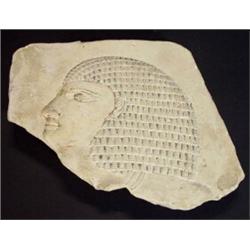 Stoneware plaque carved in relief of a bust of an Egyptian with headdress, 17cm in length…