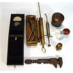 Selection of early tools including brass oil syringes, a Ferranti cased voltmeter, Acme wrench, L…