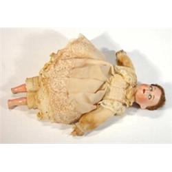 Small Armand Marseille bisque headed doll with open and close eyes and open mouth in a lace trimm…