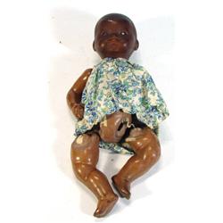 Armand Marseille black jointed doll with open and close eyes, marks to head, 24cm high…